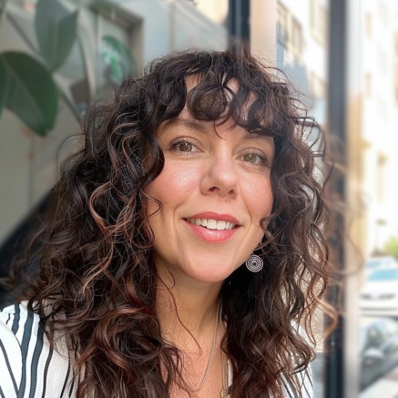 Long Layers with Curly Bangs